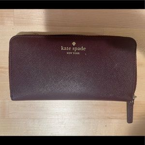 Kate Spade Mikas Pond Lacey long wallet in beautiful Plum / Burgundy color